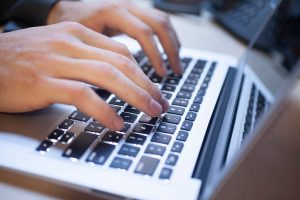 image of person emailing Editorial Consultancy